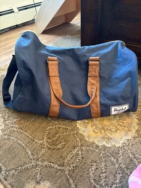 Herschel Supply Company Navy Duffel with Brown Trim and Handles